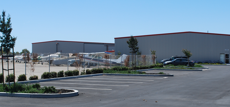 Hayward Hangars - View of Airplane Hangars and Parking Hayward Hangars - View of Airplane Hangars and Parking